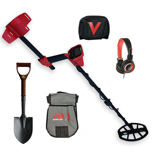 Minelab Metal detector set with accessories including a shovel, headphones, and bags on a white background.